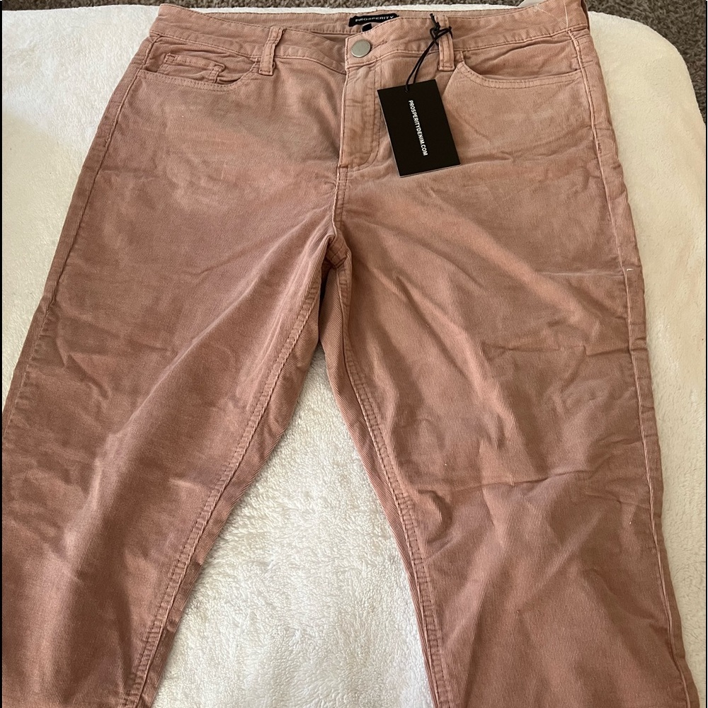 New with tags rose colored corduroys, size 32